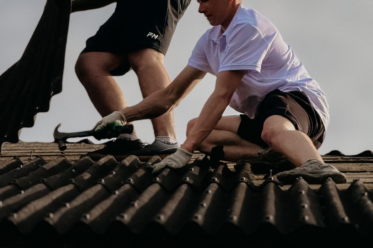 Roof inspection and documentation by a roofing crew